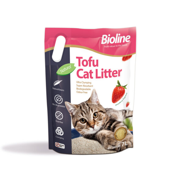 Front view of the Bioline Tofu Cat Litter bag in the Strawberry fragrance. The pink and white packaging features a tabby kitten lying in the litter next to a strawberry icon. The bag lists key features with icons, including 'Natural beans,' 'Bio-degradable,' 'Dust free,' and 'Clumping,' with a net content of 7L.