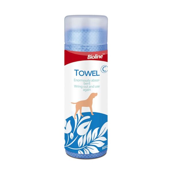 Product image of the Bioline pet towel in its cylindrical plastic packaging. The packaging is white, red, and blue. The top lid is translucent blue, showing the rolled-up blue towel inside. A red arc contains the "Bioline" brand name. The center has the word "TOWEL" in large blue letters, with the description "Enormously absorbent" and "Wring out and use again" below it. The bottom blue section features a silhouette of a standing dog and a decorative white leaf pattern. The dimensions "66X43" are printed on the bottom right.