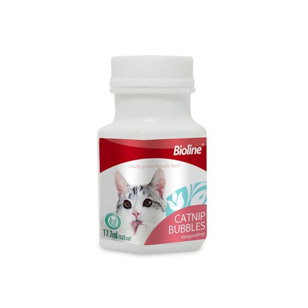 Front view of the Bioline Catnip Bubbles bottle. The small white bottle has a red and white label featuring a cat with its tongue sticking out and text that reads 'CATNIP BUBBLES Invigorating,' with a volume of 17.7 ml.
