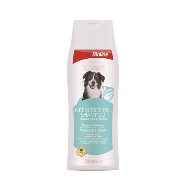White plastic bottle of Bioline Neem Tree Oil Shampoo, 250ml size, for mild care against parasites, featuring an image of a black and white dog on the label.