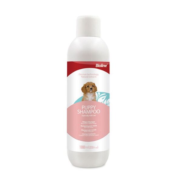 Large white plastic bottle of Bioline Puppy Shampoo, 1000ml size, a gentle shampoo for delicate skin and coats, featuring an image of a small brown and white puppy on the label.