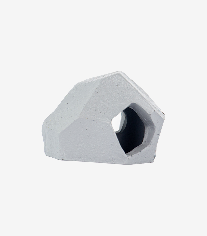 Animated Rock aquarium decoration, a small gray stone with a geometric shape and a single hideaway hole.