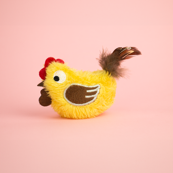 Zugo Rooster Plush Catnip Toy, a plush toy shaped like a rooster that is yellow with brown embroidered wings, red felt comb and wattle, and a brown feather tail.