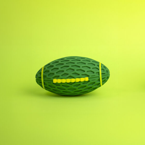 Rugby Ball Rubber Dog Toy, a green, rugby ball-shaped toy with a honeycomb texture and bright yellow bands.