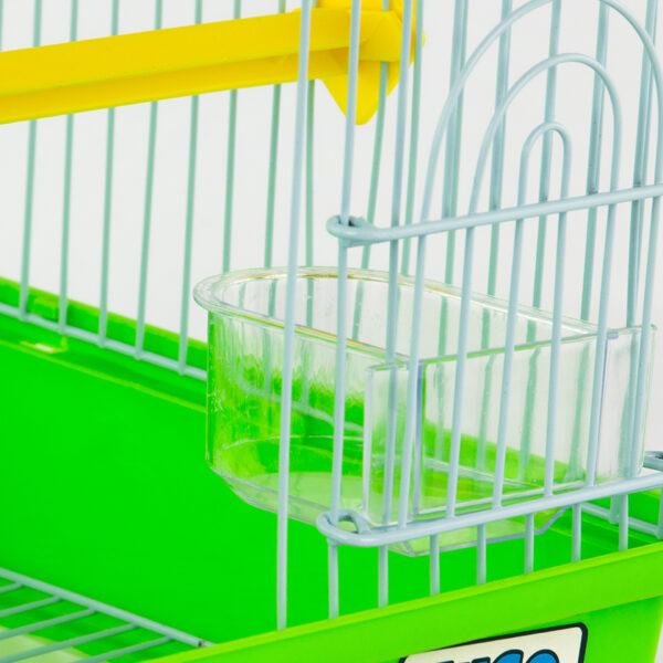Zugo Seed Feeder Inside Cup, a clear plastic seed feeder cup attached to the white wire side of a bird cage with a green base and a yellow perch inside.