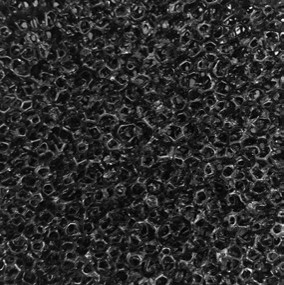 Oceanmax Bio Sponge Filter Media (PPI 10), a close-up image showing a black, coarse, and highly porous foam material, designed for high-capacity mechanical and biological filtration in aquariums.