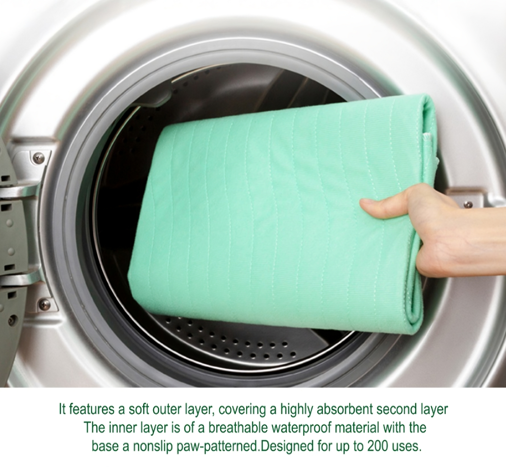 Reusable Puppy Pad in Washing Machine, a hand placing a folded, quilted, mint green reusable pet pad into the open drum of a front-loading washing machine, illustrating that the pad is machine washable and designed for up to 200 uses.