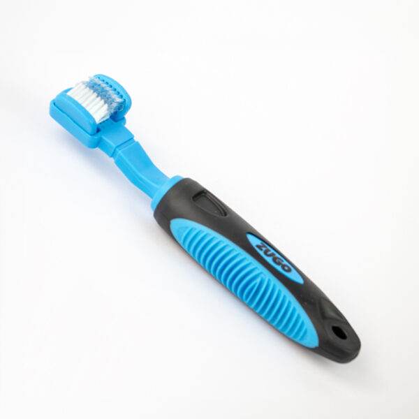 Dog Tooth Brush, a blue and black three-sided toothbrush with a blue handle that has a black textured grip and the word ZUGO in blue letters.