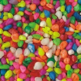 Oceanmax Rainbow Gravel Fish Tank Substrate Stones, a close-up image showing a tightly packed mixture of small, smooth, highly polished artificial gravel (3-5mm stones) in a wide variety of bright, vibrant colors including pink, green, yellow, orange, blue, red, and white.
