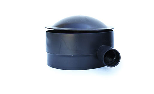 UltraZap 50mm Concrete Bottom Drain. Black unit with a dome cap and a single large side pipe connection.